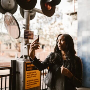 20-something walking alone through a city — searching for balance between life and career