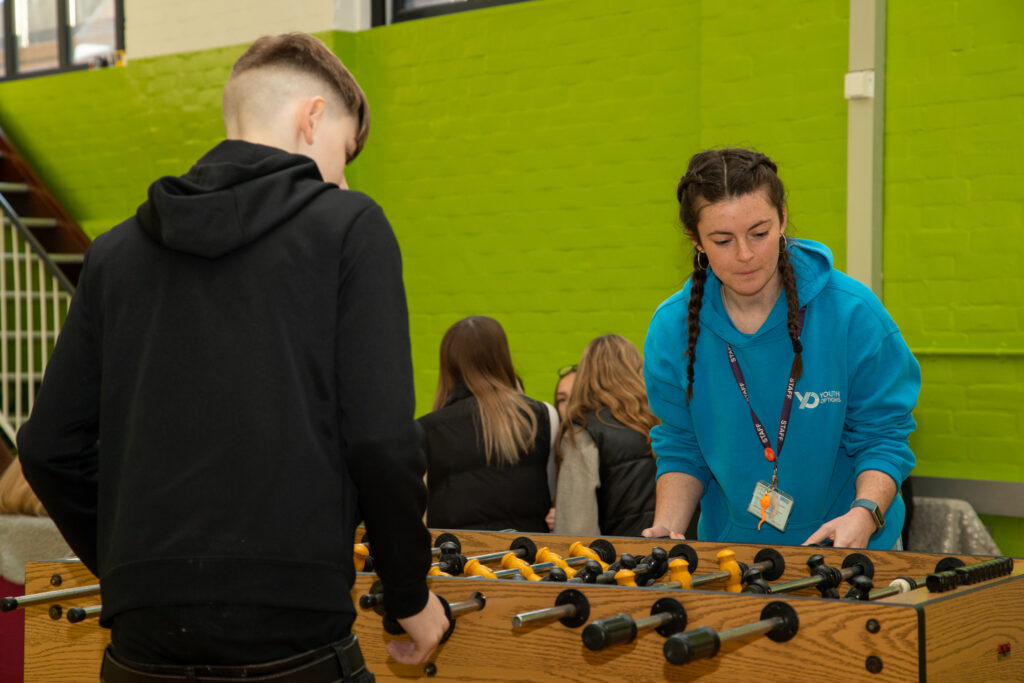 A picture of young people at a youth club