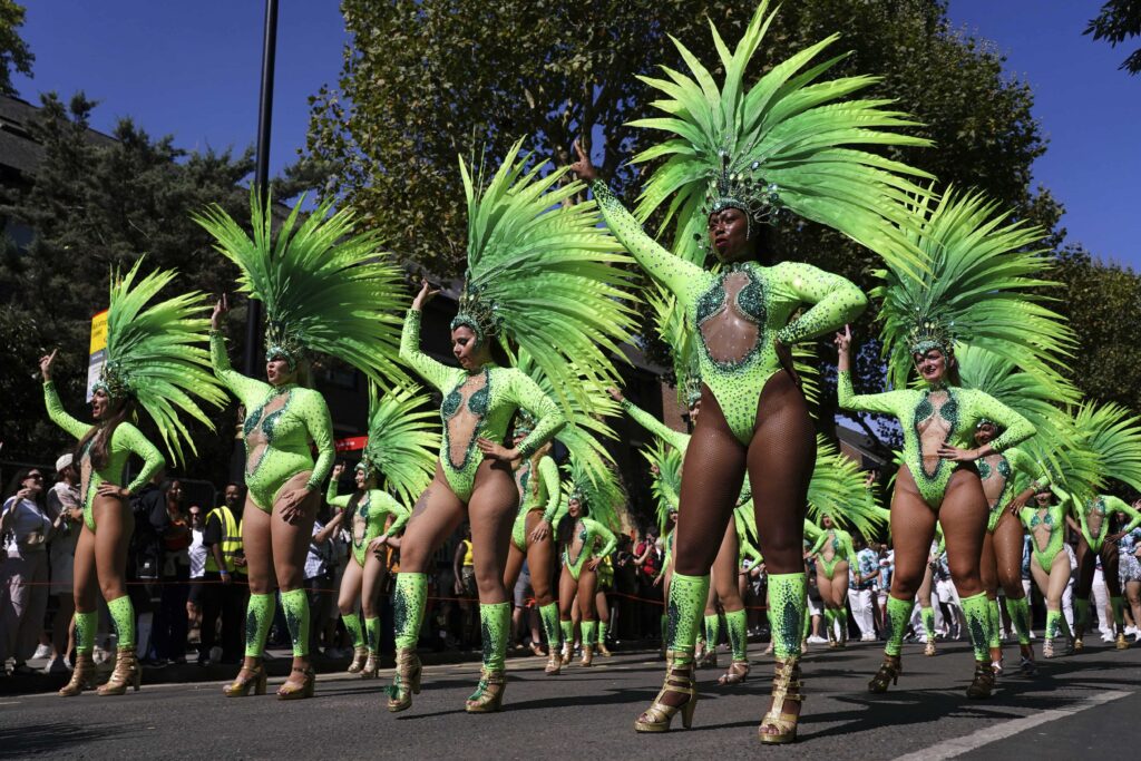 Notting Hill Carnival dancers celebrating 