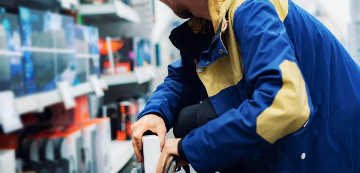 A young person stealing- showcasing Kleptomania in the act