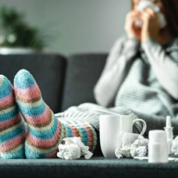 istockphoto-1124732633-612x612 woman on the sofa sick from the flu season