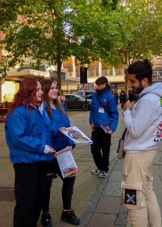 our youth vendors here at inside success union c.i.c selling our magzine to members of the public