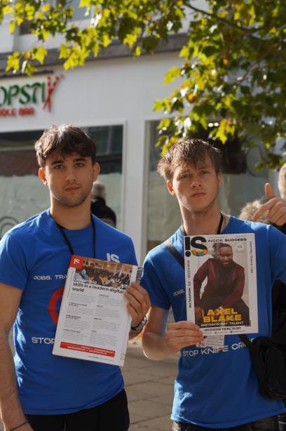 our youth vendors here at inside success union c.i.c selling our magzine to members of the public