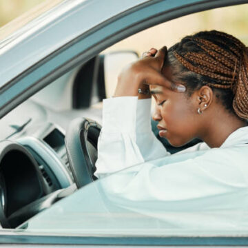 Young person stressed from learning how to drive to show why less young people are choosing to get their drivers license