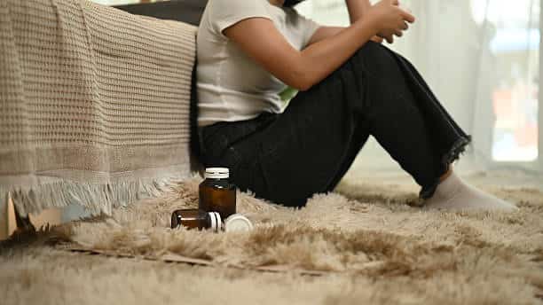 Young person struggling with mental health, a contributing factor to the one out of four young uk teens who commit suicide 