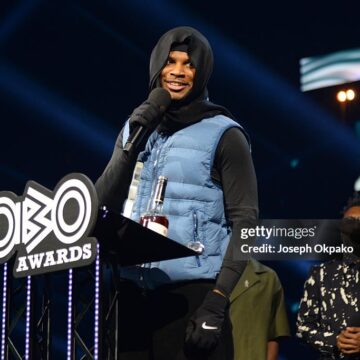 Photo of Jim Legxacy performing a speech at the 2026 Mobo Awards