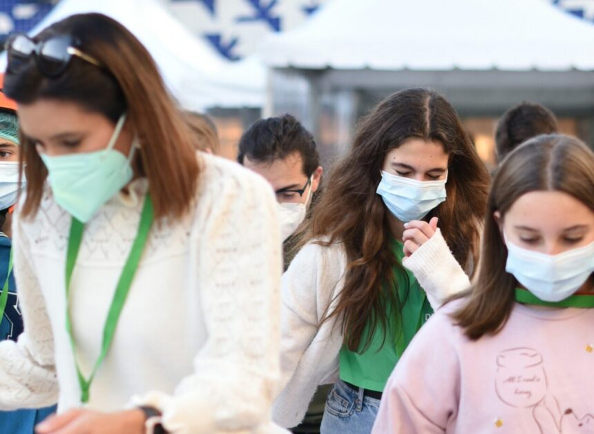 Girls wearing face masks. Photo Credit: Joao Viegas on Unsplash