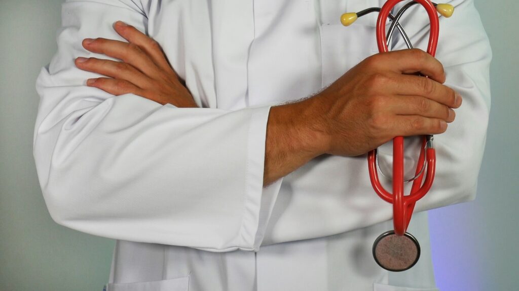 A photo of a doctor holding a stethoscope.