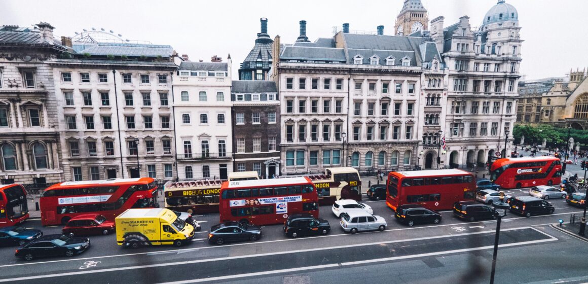jay-wennington-YdmyAIT5X98-unsplash Photoraph of traffic in london with TFL busses