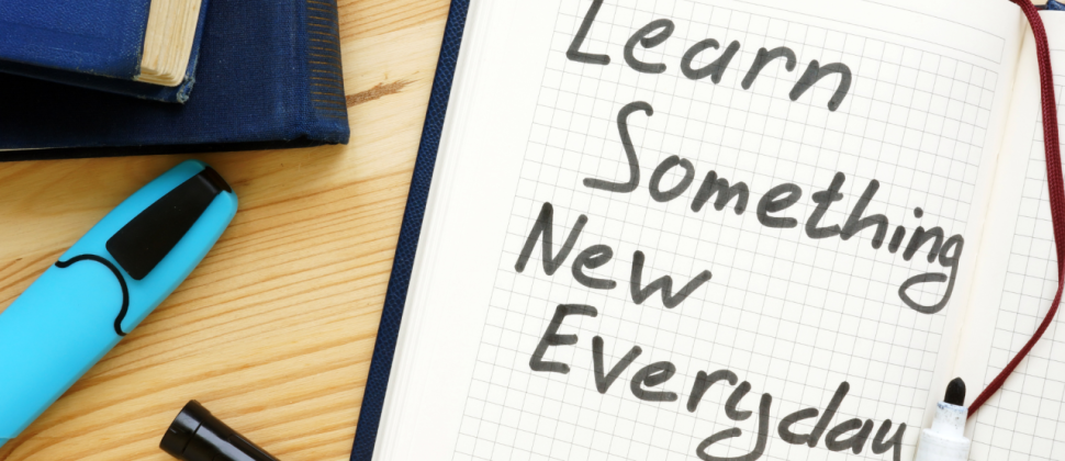 A note book that says learning something new everyday