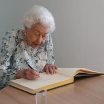 Queen Elizabeth II writing