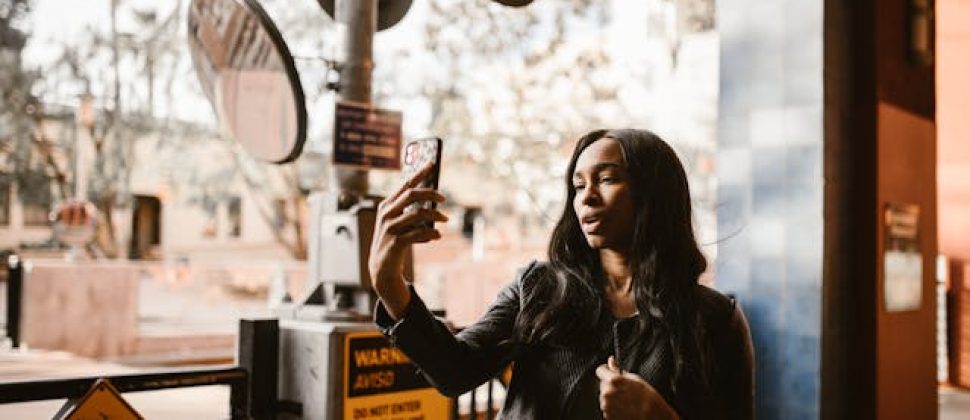 20-something walking alone through a city — searching for balance between life and career