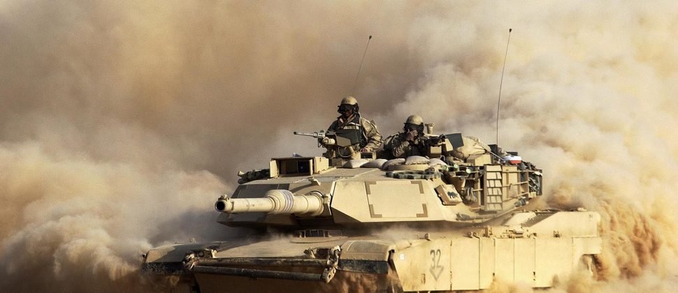 A U.S. Army 3rd Infantry Division M1/A1 Abrahams tank moves deeper into Iraqi territory March 23, 2003 south of the city of An Najaf. U.S. and Britis